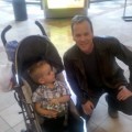 Kiefer Sutherland posing with a baby