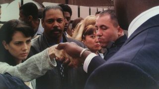 Mandy shaking President David Palmer's hand in the 24 Season 2 finale