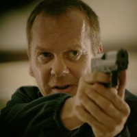 Jack Bauer points gun in 24 Season 5 Episode 2