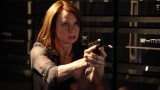 Chloe O'Brian pointing gun in 24 Season 8 Episode 13