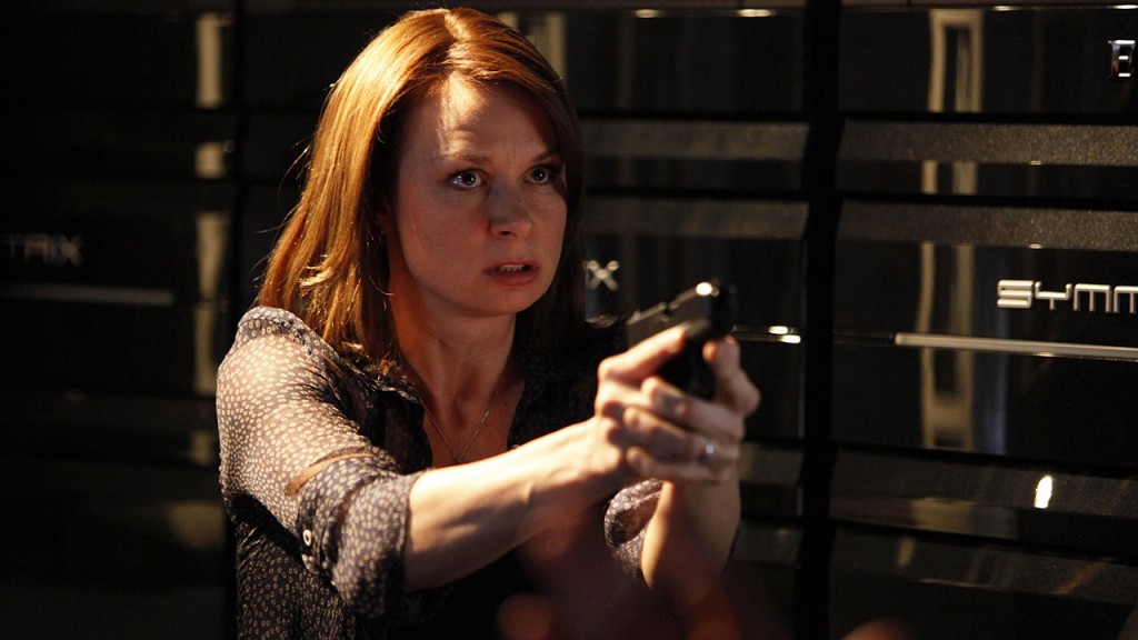Chloe O'Brian wields a gun inside CTU in 24 Season 8 Episode 13