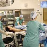 Surgeons over Renee Walker's corpse 24 Season 8 Episode 18