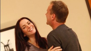 Annie Wersching and Kiefer Sutherland laugh behind the scenes