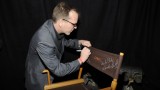 Kiefer Sutherland signs chair at 24 Series Finale Party