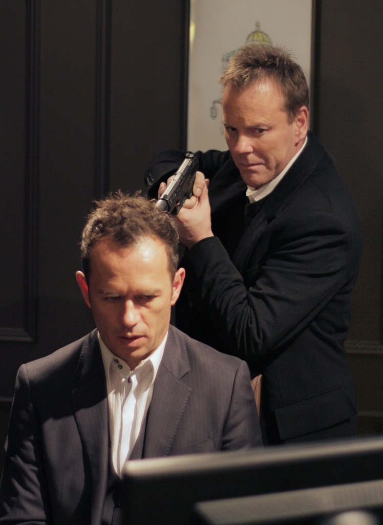 Kiefer Sutherland and Greg Ellis in The Confession promo pic