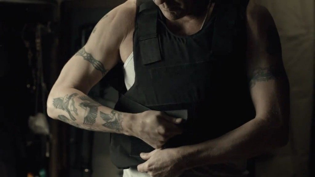 Kiefer Sutherland in The Confession bulletproof vest, tattoos