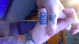 24 logo tattoo thumbs