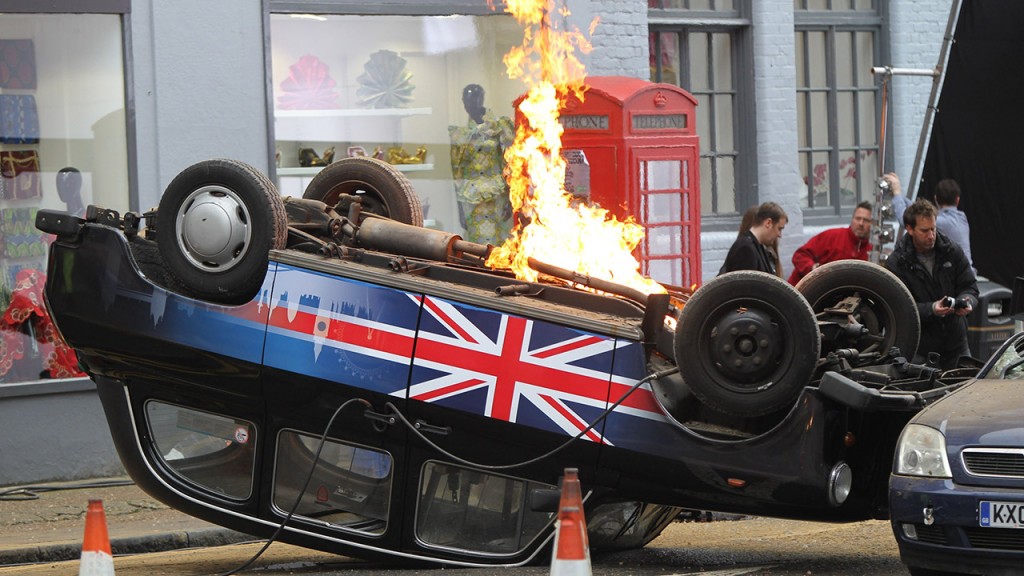An overturned Union Jack cab in 24: Live Another Day promotional video shoot