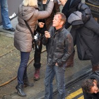 The makeup team works on Mary Lynn Rajskub and Kiefer Sutherland between takes