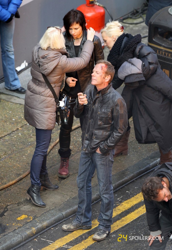 The makeup team works on Mary Lynn Rajskub and Kiefer Sutherland between takes