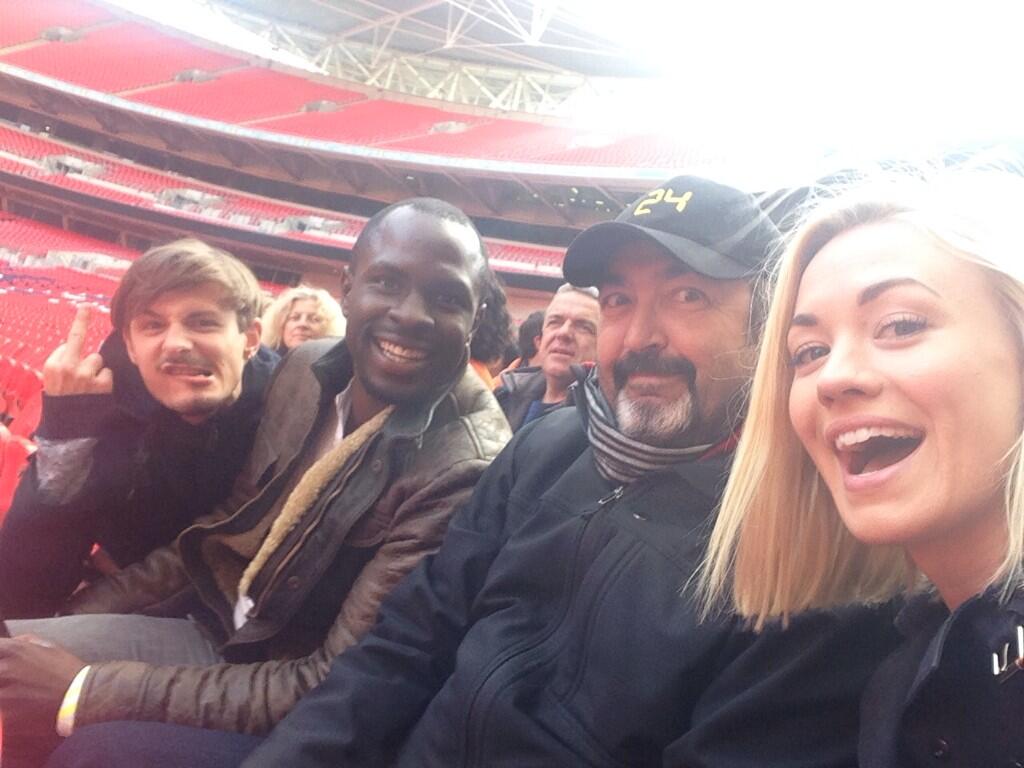 Giles Matthey, Gbenga Akinnagbe, Jon Cassar, and Yvonne Strahovski at Wembley Stadium filming 24: Live Another Day.