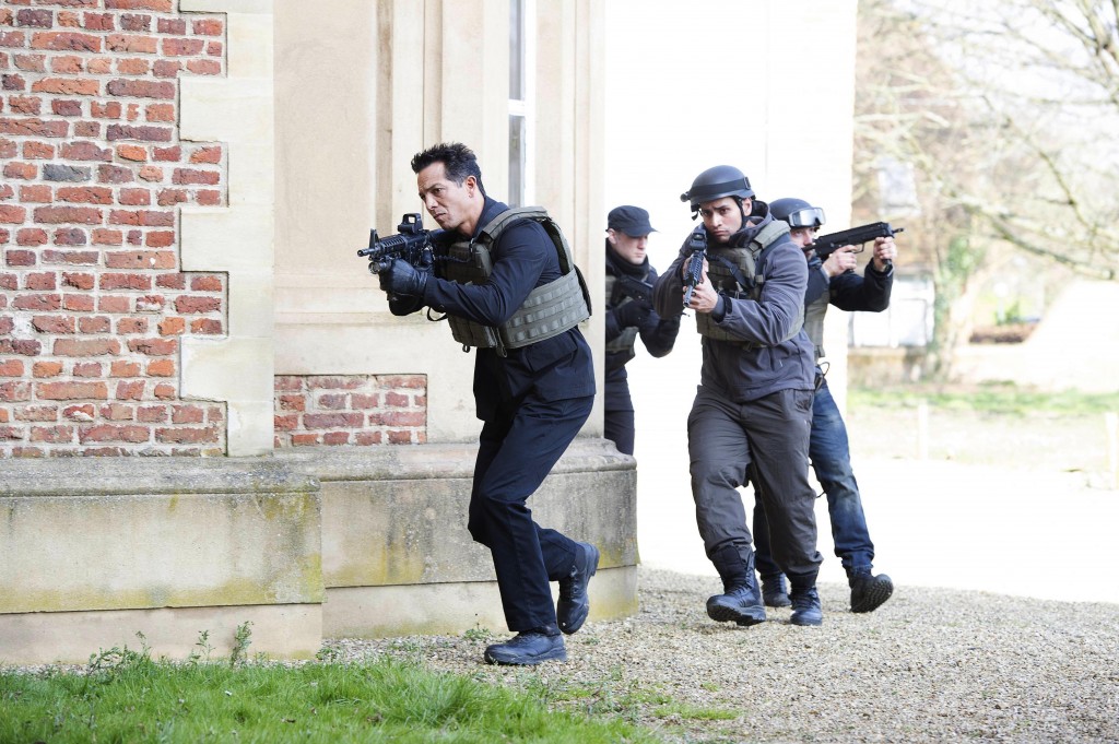 Steve Navarro (Benjamin Bratt) raids a secret location in 24: Live Another Day Episode 5