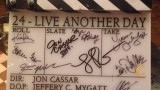 Signed 24 clapper board at 24: Live Another Day wrap party