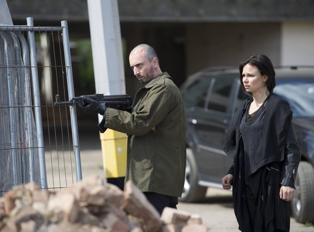 Belcheck (Branko Tomovic) guards Chloe O'Brian (Mary Lynn Rajskub) in 24: Live Another Day Finale