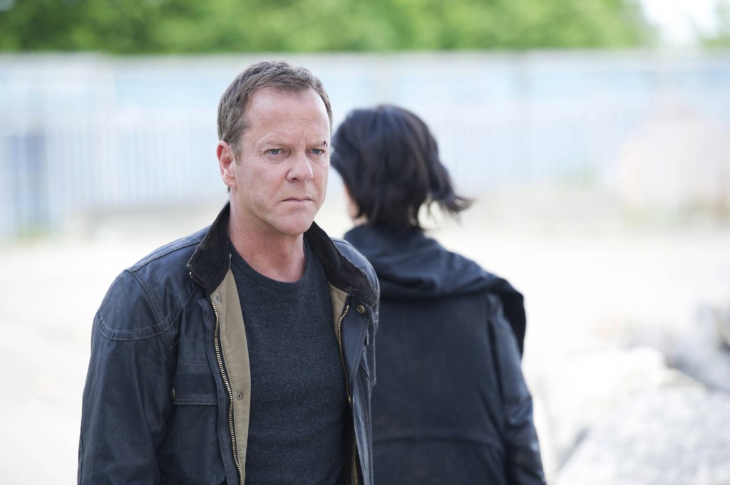 Jack Bauer (Kiefer Sutherland) trades his freedom for Chloe O'Brian (Mary Lynn Rajskub) in 24: Live Another Day Finale