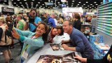 Kiefer Sutherland poses with fans at Comic-Con 2014