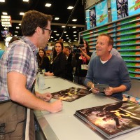 Kiefer Sutherland greeting a fan at San Diego Comic-Con 2014