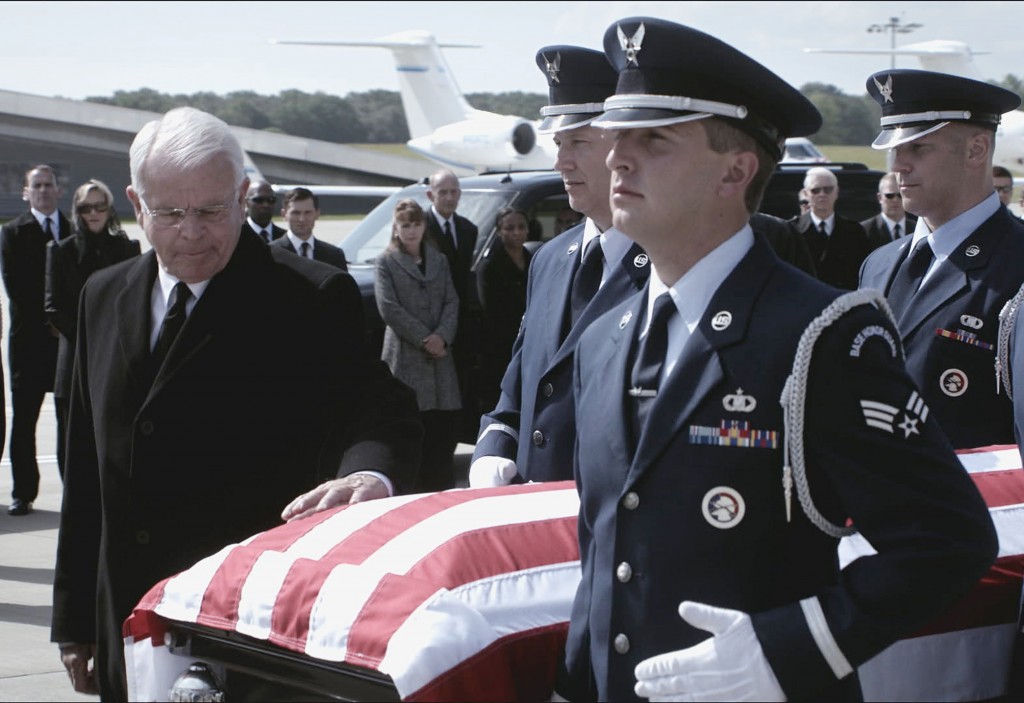 President Heller (William Devane) escorts Audrey's coffin to Air Force One in 24: Live Another Day Finale