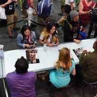 24: Legacy cast members signing autographs at 24: Legacy San Diego Comic-Con 2016 Fan Signing