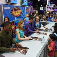 24: Legacy cast members signing autographs at 24: Legacy San Diego Comic-Con 2016 Fan Signing