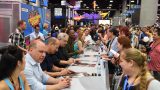 24: Legacy cast members signing autographs at 24: Legacy San Diego Comic-Con 2016 Fan Signing