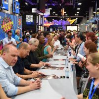 24: Legacy cast members signing autographs at 24: Legacy San Diego Comic-Con 2016 Fan Signing