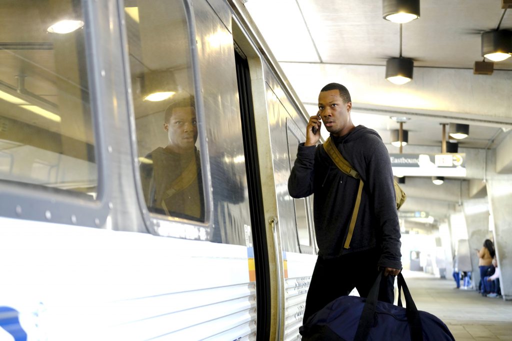 Eric Carter (Corey Hawkins) boards train in 24: Legacy Episode 3