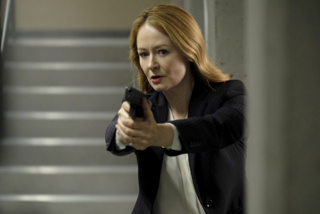 Rebecca Ingram with gun inside CTU - 24: Legacy Episode 9