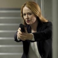 Rebecca Ingram with gun inside CTU - 24: Legacy Episode 9