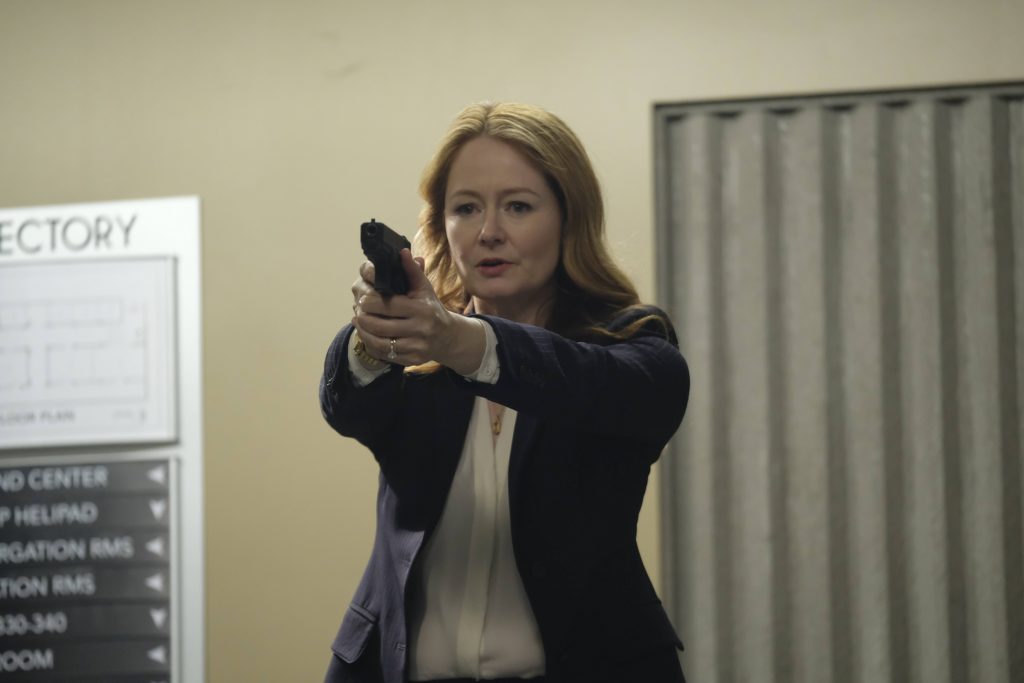 Rebecca Ingram with gun inside CTU - 24: Legacy Episode 9