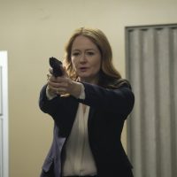 Rebecca Ingram with gun inside CTU - 24: Legacy Episode 9